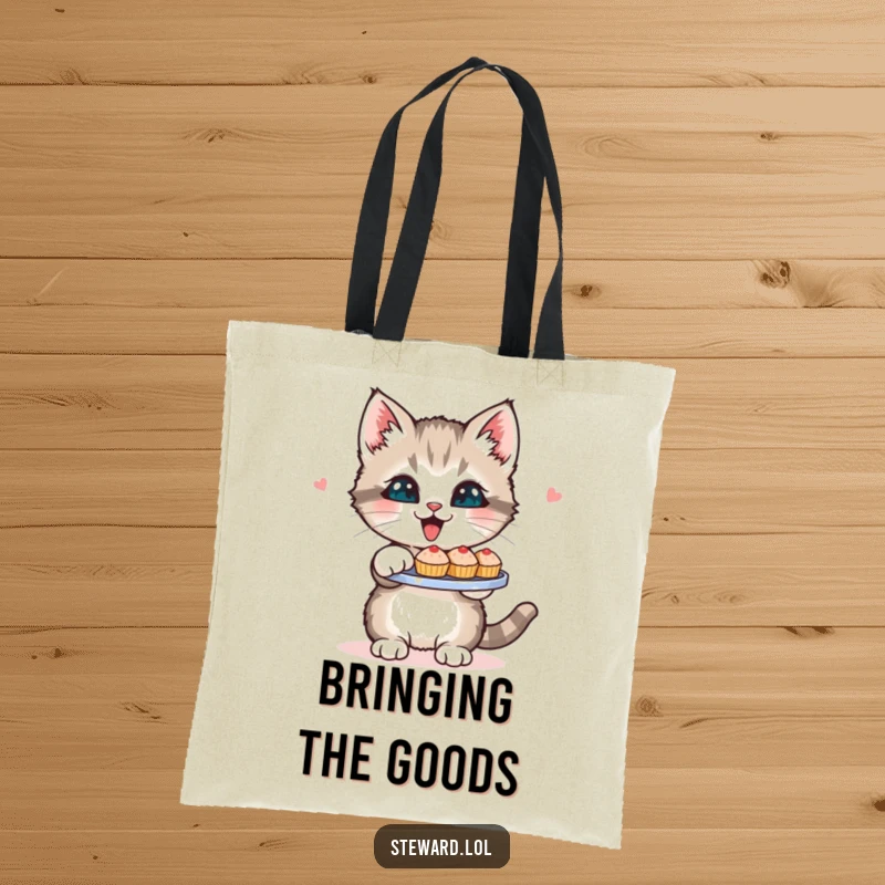 Funny Kitten Tote Bag: A charming tote bag featuring a happy kitten with a tray of tiny baked goods, perfect for carrying items with a smile.